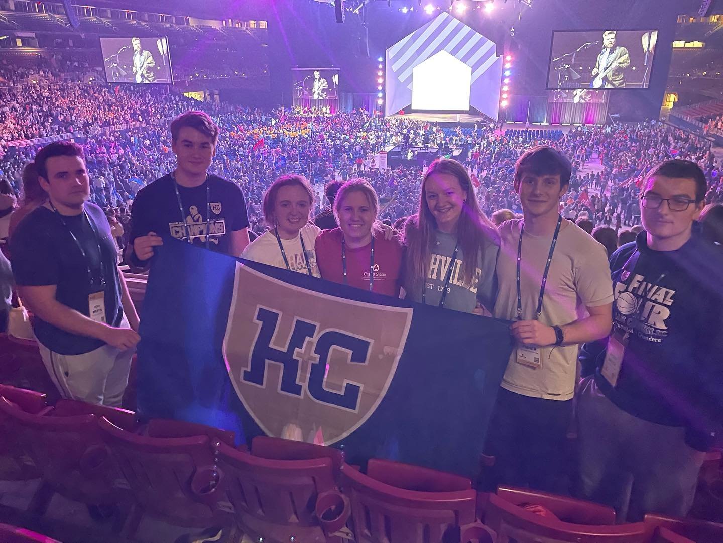 Students from Helias Catholic High School in Jefferson City gather with their banner in the Dome at America’s Center in St. Louis during the SEEK23 conference.
